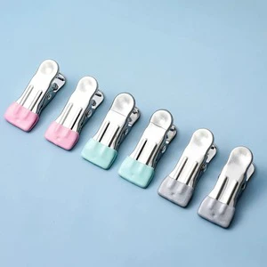 Multi-functional Stainless Steel Clip with Plastic Garment Cover, Seamless Garment Clip, Waterproof and Windproof Bag Accessory.