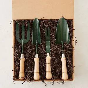 Four Piece Garden Hand Tool Gift Set With Wooden Handle For Planting Digging And Soil Care