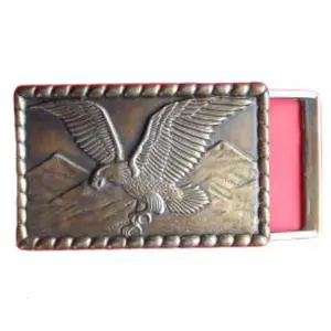 vintage solid brass belt buckle featuring a soaring eagle over a mountain range Buckle