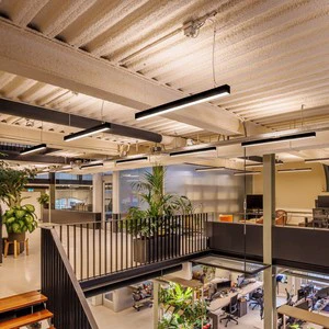Surface Mounted LED Linear Fixture with Prismatic Lens and Emergency Backup