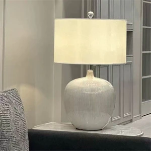 Contemporary Neutral Ceramic Table Lamp with Cylindrical White Minimalist Fabric Shade for Bedroom Hotel Villa Living Room