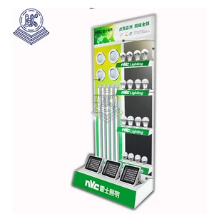 Freestanding Metal Merchandising Rack Exhibition Display Shelf LED Light Bulbs Spotlights Ceiling Lamps Lighting Retail Showroom
