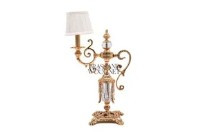 Antique brass and crystal decorative table lamp with ornate base and small fabric shade for luxury interiors